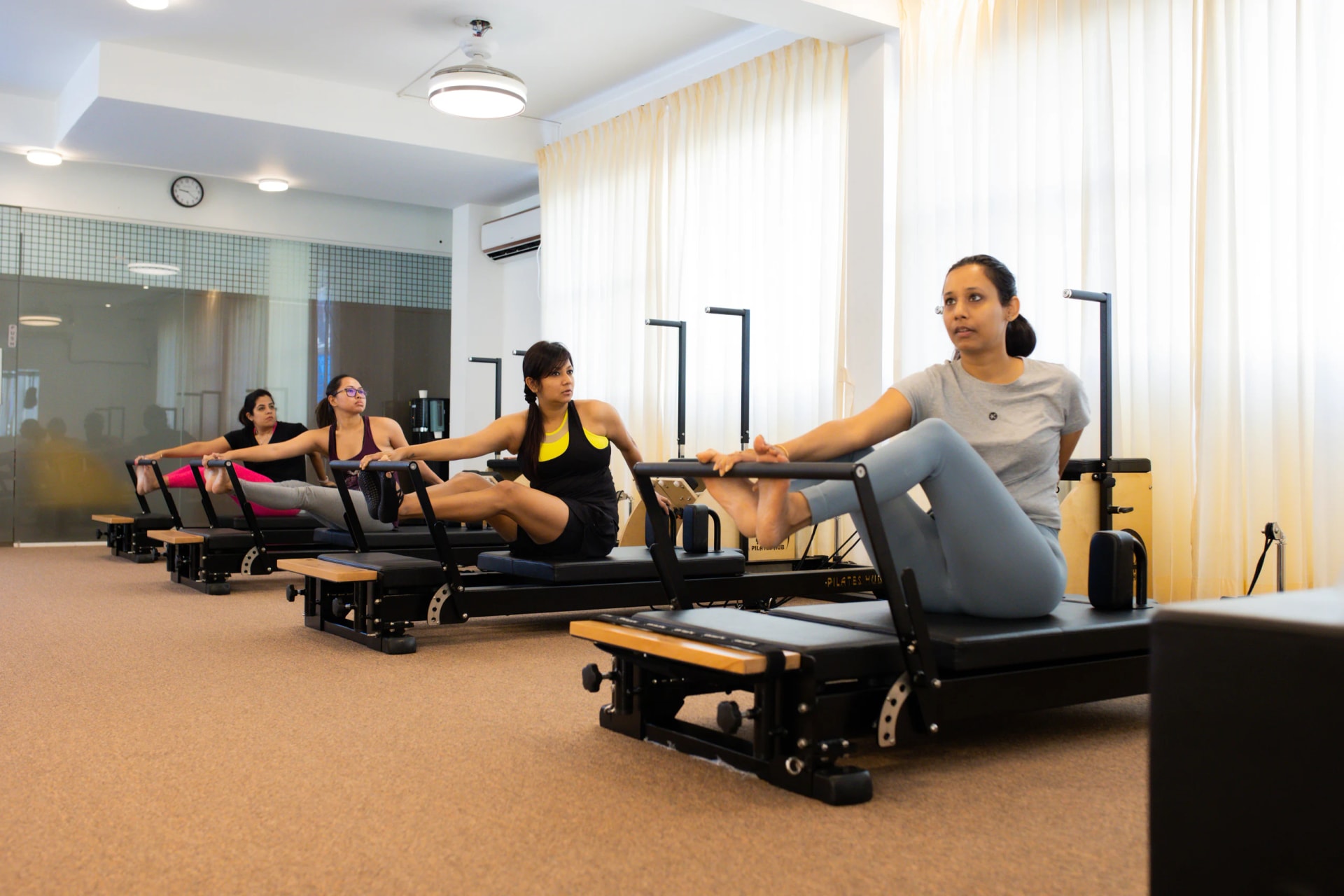 Pilates practitioner, pose 2 of 4